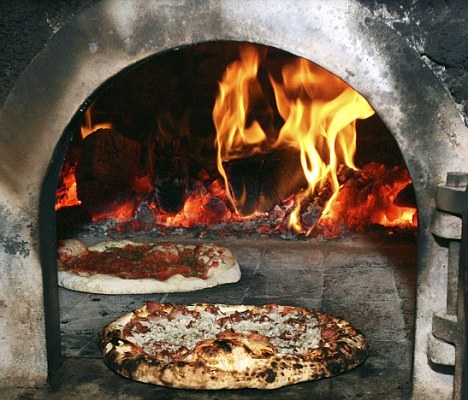 Mmmm, Pizzas baked in ovens lit with wood from coffins