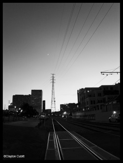 refugado:  claytoncubitt:  Crescent moonrise over the CBD, New Orleans  by Clayton Cubitt 