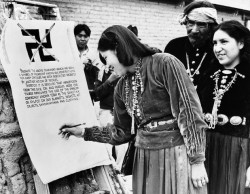 arachnomatic:  aka14kgold:  vulturehooligan:     Another photo of the Navajos banning the swastika.The document they are signing starts off: “Because the above ornament, which has been a sign of friendship among our forefathers for many centuries