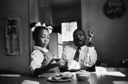  King said in an interview that this photograph was taken as he tried to explain to his daughter Yolanda why she could not go to Funtown, a whites-only amusement park in Atlanta. King claims to have been tongue-tied when speaking to her. “One of the