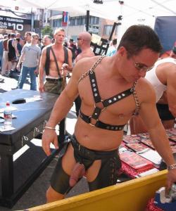 Showing off at the street fair.  [ #gayporn #gay #porn #leather #uncut #public #exhibitionist #nipplering ]