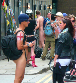 femdomstyle:  Nice variation on the cfnm theme. The London World Naked Bike Ride, a “… peaceful, imaginative and fun protest against oil dependency and car culture. A celebration of the bicycle and also a celebration of the power and individuality