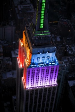 thedailywhat:  Photo of the Day: The Empire State Building’s pre-scheduled rainbow light display honoring NYC Pride Week becomes that much more meaningful in light of the state’s legalization of same-sex marriage. [@thinkprogress.]  