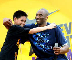 fuckyeahlakers:  Los Angeles Lakers player Kobe Bryant embraces a boy during his interaction with his fans Wednesday July 13, 2011 at suburban Taguig city east of Manila, Philippines. Bryant was in Manila for the third time to kick off his five-city