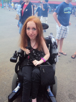 stophatingyourbody:  this is me. i’m emily. i was born with spinal muscular atrophy type 2, it’s a muscle disease. basically, my muscles get weaker as i get older and i cannot walk. i used to cut out my face because i was insecure of being crippled