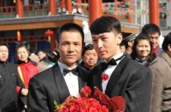 gay-men:  These couples in Wuhan, China married publicly as a form of activism on behalf of equal rights for gay couples. China does not currently recognise same-sex marriages.  