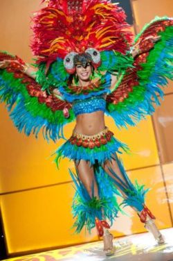 O.k.  This is Ms Bolivia and her &ldquo;national costume&rdquo;, but really even without some restraints you&rsquo;ve got one hell of a potential fetish here.  Maybe this could be a sub-fetish of the whole petgirls thing.  Call it Parrot Girls or Bird