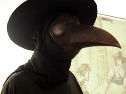 creepylittleworld:  During the Bubonic Plague, doctors wore these bird-like masks to avoid becoming sick. They would fill the beaks with spices and rose petals, so they wouldn’t have to smell the rotting bodies.  A theory during the Bubonic Plague