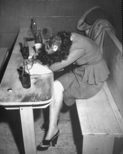 Lady feeling the effects of too much liquor. Kansas, 1946 © Mark Kauffman