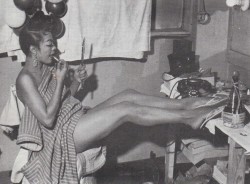 Ruby Richards relaxes in her backstage dressing room.. This 5&rsquo; 3&quot; dancer got her start at the &lsquo;Latin Quarter&rsquo; nightclub, in New York City..