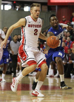 lightpocket:  Rutgers’ Austin Carroll has the ball tipped away from him by Hampton’s Jasper Williams during 1st half mens basketball at the RAC in Piscataway on Sunday, November 20, 2011. Rutgers defeats Hampton 66-52. Andrew Miller/For The Star-Ledger