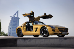 automotivated:  The “Desert Gold” Mercedes-Benz SLS AMG in front of the Burj Dubai (by SLS AMG) 