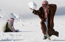 hijabby:  ircimages:Jordanian Bedouins having fun with the snow. Genuine happiness. This makes me so happy
