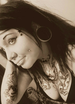 tattoosfuckyea:  fuck yea gauged ears, pierced nipples and corset’s http://tattoosfuckyea.tumblr.com/ 