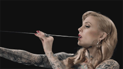 theluckyhell:  Lovely gif of me swallowing my big sword Taken from the Olavi Uusivirta music video I shot earlier this year &lt;3 