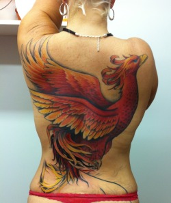 fuckyeahtattoos:  My Phoenix is fierce, strong, determined, and beautiful. It is me, reborn and reinvented as I enter and attack the second half of my life. Artist: Jessie Hopeless, Exile Tattoo, Kansas City, MO