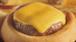 the-absolute-best-gifs:  gifhound: OMG. WTF. Pizza Hut introduces the Crown Crust Burger Pizza - a pizza encrusted by cheeseburgers. Only available in the Middle East. Follow this blog, you will love it on your dashboard 