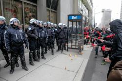 t92marihoene:  mrsloki:  theletterwsarseflap:  mayuhro:  052412:   Montreal student protesters baiting riot police with donuts.  only in canada  always fresh, always tim hortons    We do what we cab  *applauding*