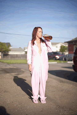 Brittany said she had these cute bunny footy pajamas she wanted to shoot in so of course I bought her a 40oz. of malt liquor and took her to the dirtiest alley in my neighborhood.  “It’s not that great,” she blurted, making a face as she swallowed