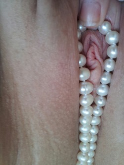 secretdaddy:  I imagined draping the pearls over your cock. Using the bracelet around your balls. Wrapping your cock with them… Loose enough so I could roll them up and down the shaft while I sucked and licked and kissed the head. 