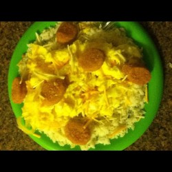 Ghetto Cuisine of eggs, white rice, cheese and chicken nuggets👌#food #ghetto #hoodrich #mami #apartmentproblems  (Taken with instagram)
