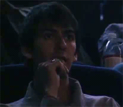 Dhani Harrison watching his father George Harrison on screen. 