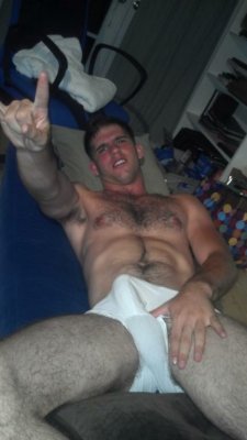 white-briefs-lover:  bigbeautifulbulges: Cum and Get It!!  Wow, what a hottie. Love his hairy chest and the big bulge in his WHITE briefs!