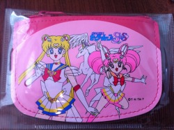 girlswithwands:  JUST ARRIVED ^.^ SAILOR MOON SUPER S COIN BAG! I AM IN LOOOOOOVE + a crown pinky ring and a half pink half purple heart ring!