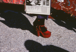  Aftermath A woman in red heels holds a copy of Aftermath by the Rolling Stones at a market somewhere in Mexico March 1972 