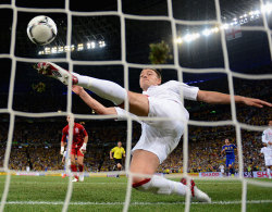 siphotos:  In one of the most controversial plays of Euro 2012, John Terry just clears a shot at the goal line by Marko Devic during England’s 1-0 victory over Ukraine on Tuesday. (Laurence Griffiths/Getty Images) TURNER: Fight broils game technology