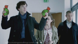 sherlockholdingpairsofthings:  Sherlock holding a pair ofÂ titties. [x]  Sherlock Holding Pairs of Things Week: Day 7
