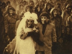 bunnywith:  carry-on-my-consulting-tardis:  m0rtality:  Due to high sulfur levels, inhabitants of the Izu Islands had to wear gas masks to survive. What results? Some of the scariest wedding photos ever.  are you my husband?  omg  