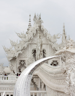 mybackyardcemetery:  Wat Rong Khun is a contemporary unconventional Buddhist and Hindu temple in Chiang Rai, Thailand. Construction began in 1997 and is expected to be completed by 2070.