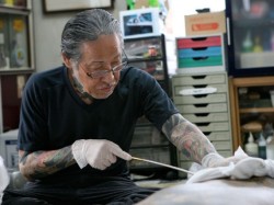 fall-o-cl0ck:  The Japanese tattoo master, Horiyoshi III specializes in the highly refined art of Horimono and still injects the ink under skin meticulously by hand (a method known as tebori) unlike the popular mechanized tattooing process we are familiar