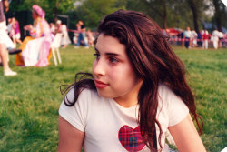 Amy Winehouse in her early teens, taken from Amy My Daughter by Mitch Winehouse, published by HarperCollins ‘A thoughtful Amy, still in pink and with her heart symbol of course, at her school summer fete’ 