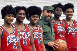 timelightbox:  Fidel Castro poses with the Cuban women’s basketball team in Havana. Neil Leifer spent a year traversing the globe to photograph athletes for TIME’s 1984 Olympics special issue. From the plains of Kenya to Russia’s Red Square to The