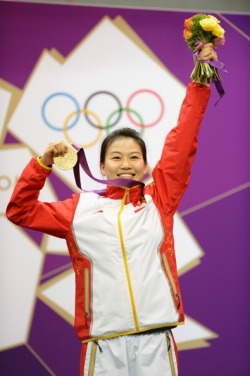 olympics:  Congratulations to Siling Yi of CHN for winning the first gold medal of the London 2012 Olympic Games in the 10m Air Rifle Shooting Final on Day 1 Photo by Lars Baron/Getty Images 