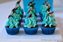 gastrogirl:  mini chocolate and vanilla shark cupcakes.  Shark Week party ideas.