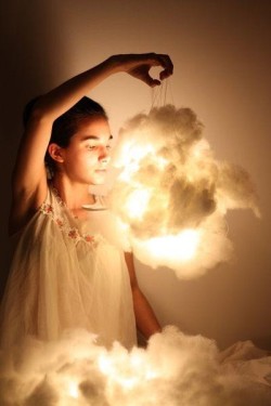 lolololori:  Cloud Lights - First, you need some cotton batting, a paper lantern, and three flameless candles, the type that Glade sells. Pull at the cotton batting until it looks fluffy, light, and cloud-like. Then, hot glue it to the outside of the