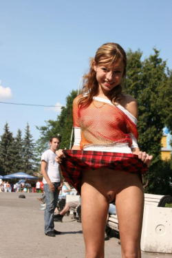 exposed-in-public:  Flash at the fair for Flashing Friday from http://exposed-in-public.tumblr.com/ flashingfemales:  Cute girl flashes her pussy while wearing a see thru shirt…and lucky guy behind her catches the flash just in time  