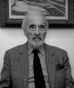 beelzebath:  Sir Christopher Frank Carandini Lee. Born 27 May 1922. His family is one of the oldest in the whole of Europe. This man is 90 years old. Lee speaks, other than his main toungue english, flowing French, Italian, Spanish and German. He also
