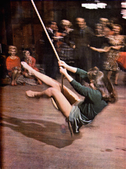 timetravelnow:  1963, Girl at party uses rope swing