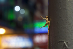 ianbrooks:  Hanging On by Slinkachu Spotted in Mong Kok, Kowloon, Hong Kong, even Slinkachu’s miniature populace has gotta make a living somehow. This image, among tons of others can be purchased in Slinkachu’s book, and you can also see it at his