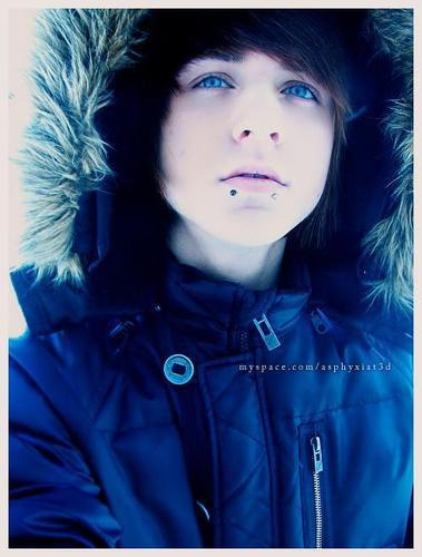Cute boy with black hair blue eyes
