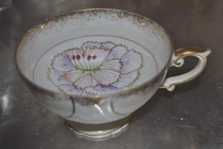 vulpinic:  forgot there was one more tea cup picture.found this cool cup in our cabinet, made in china.  so pretty. &lt;3 