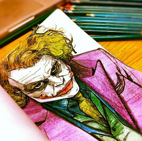 My illustration of the joker, inked and pencil coloured.  www.asplinteredsight.tumblr.com 