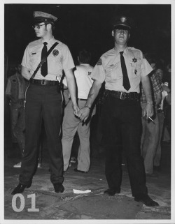 ineedtothinkofatitle:  10 Historical LGBT Moments Pictures courtesy of ONE National Gay &amp; Lesbian Archives. 01. Police Officers Holding Hands At The Los Angeles Christopher Street West Pride Parade - 1972 02. Man Holds A ‘We Are Your Children’