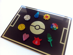 blazerdesigns:  October Giveaway: Pokemon Gym Badges It’s been a while since I’ve given away a set of the Pokemon Badges I make. So I’ll be giving away my one and only metal display that fits 1 set of magnetic Pokemon gym badges. Details for the