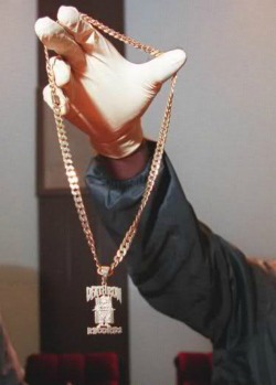 old-school-shit:  bvnds:  trill-bill:  LAPD officer beholds 2Pac’s famous Deathrow chain that was removed from his body just after his death.  THIS PHOTO IS TOTAL BULLSHIT PAC WASN’T WEARING THIS CHAIN THE NIGHT HE SUPPOSEDLY DIED!!! He was wearing