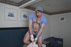 furrynerdyandalittleboozy:  I can’t tell if this is “Bedtime-Pillowfight Colby” or “Olde-Timey Sailor Colby”… Either way *sigh*  Sexy hairy man goofing on the bed - check out those hairy, meaty thighs!